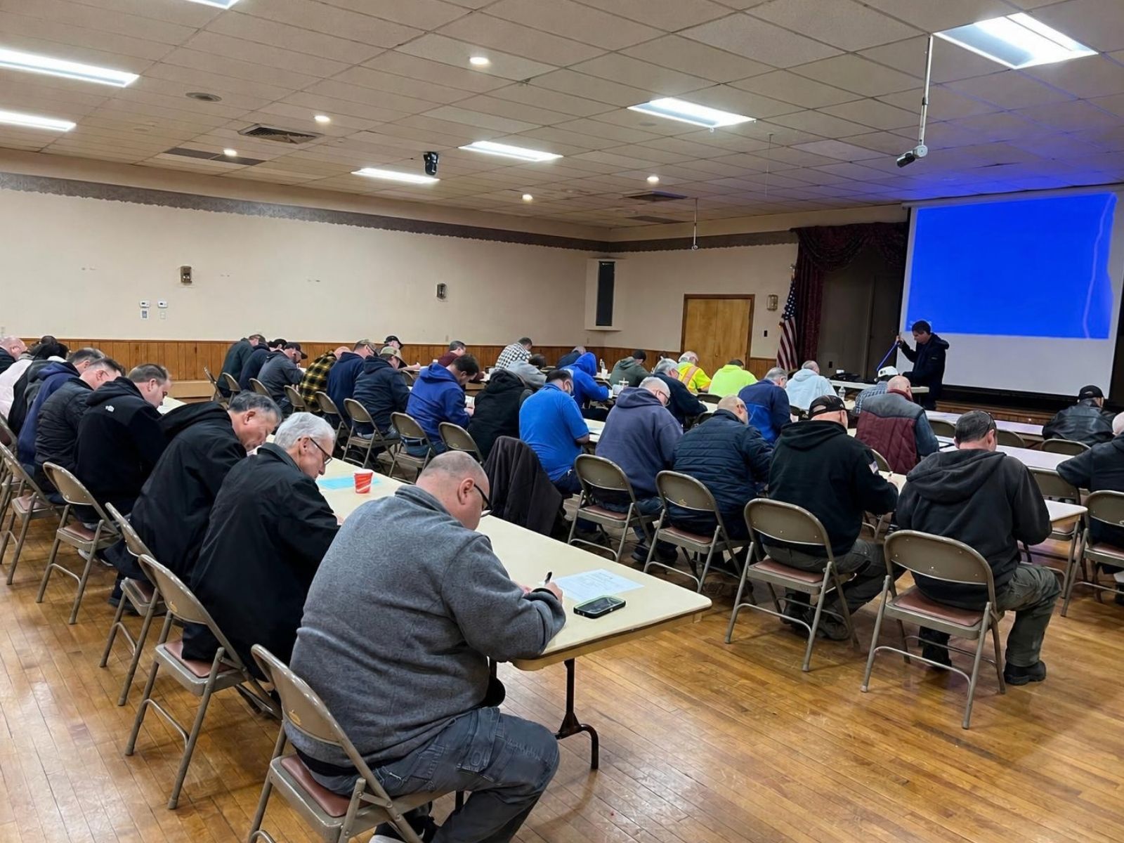 Operators seated at tables during an NJWA training class